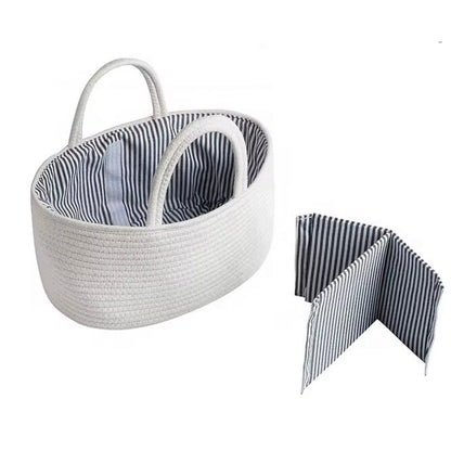  White nappy caddy with striped lining and removable dividers, versatile storage for baby items and nursery organisation.