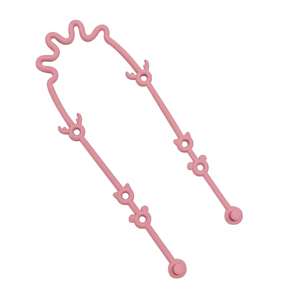 Pink silicone toy strap with multiple loops, displayed in a bent position to show flexibility.