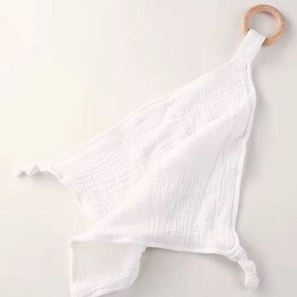 Classic white muslin comforter with natural wooden teether ring, soft and baby-friendly.