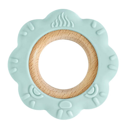 Mint green lion silicone teether with natural wood center ring.