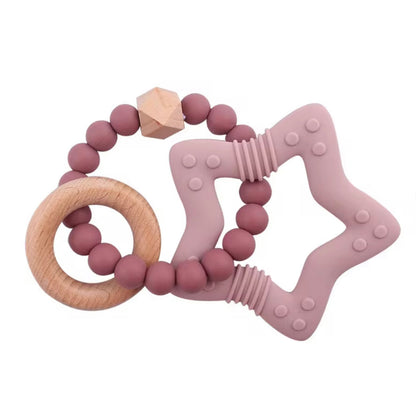 Mauve star-shaped silicone teether with wooden ring and soft round sensory beads for babies.