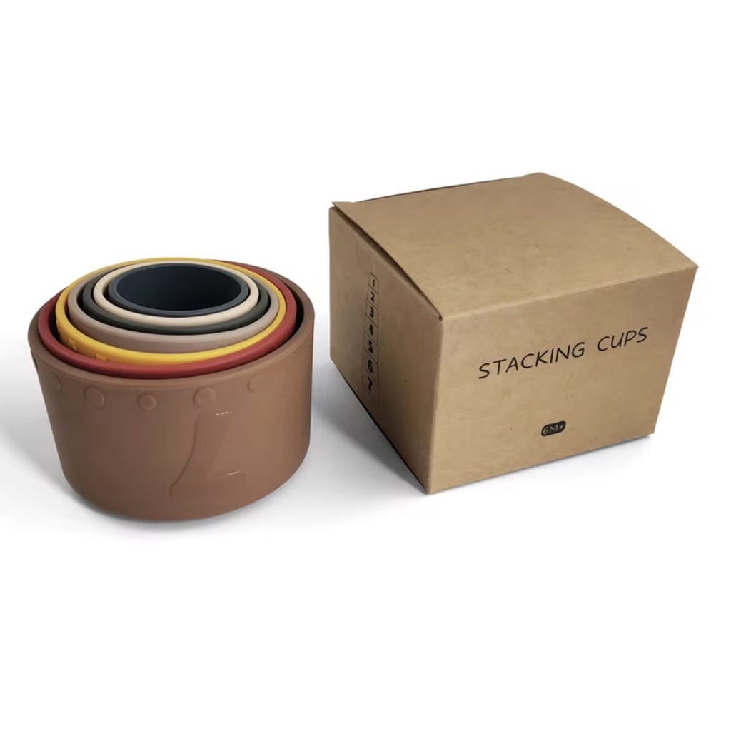 Earthy-tone silicone stacking cup set packed in an eco-friendly kraft box. Includes seven durable, food-grade silicone cups perfect for baby sensory play and sand fun.