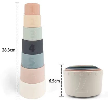 Stack & Bloom silicone stacking cup set showing size measurements. Includes seven pastel cups designed for stacking, nesting, and early development activities.