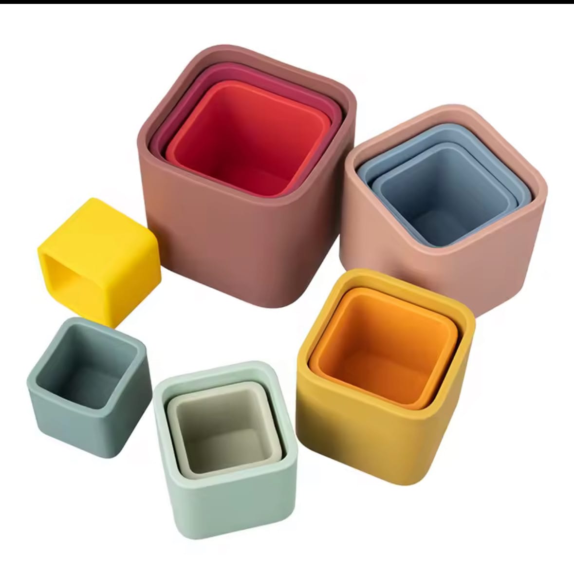 Mixed colour flatlay
“Colourful silicone stacking cups displayed in mixed sets, shown both nested and side by side.